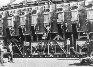 TRA39 - Baby Gauge loading ore to DVRR Gondolas Baby Gauge cars loading ore to the DVRR Gondolas - Courtesy National Park Service, Death Valley National Park